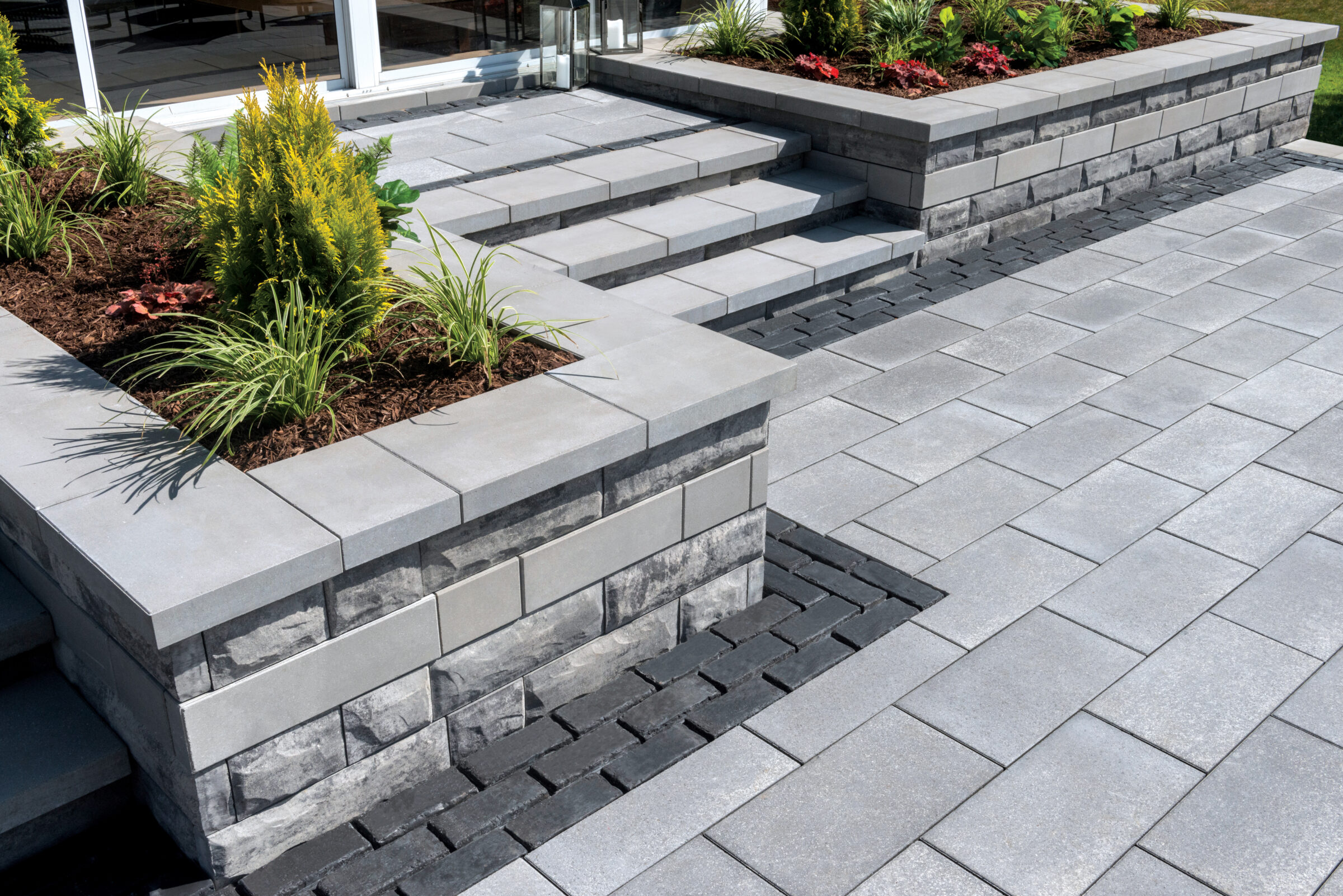 Modern patio with stone steps and plants