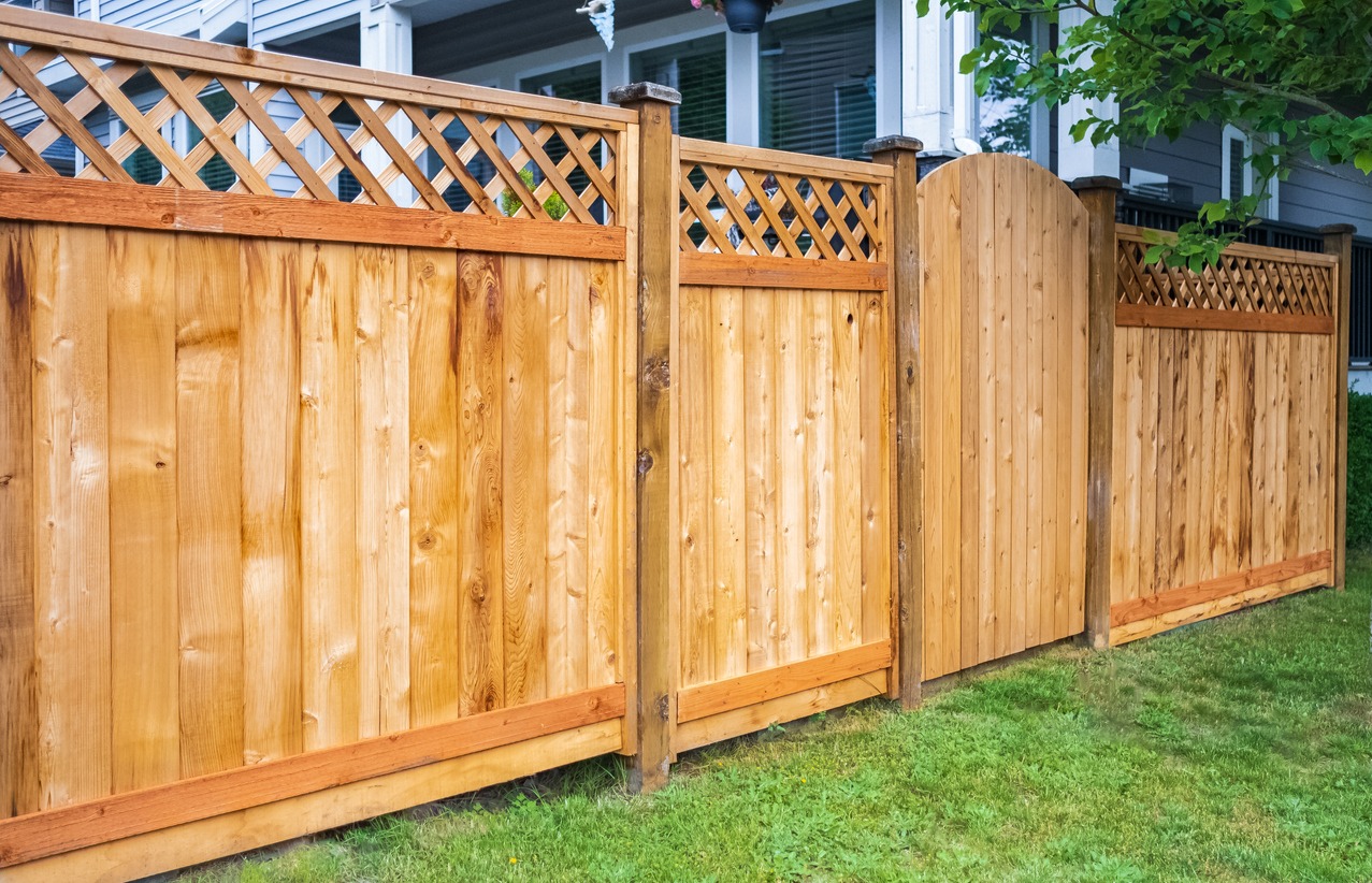 Wooden privacy fence in residential backyard