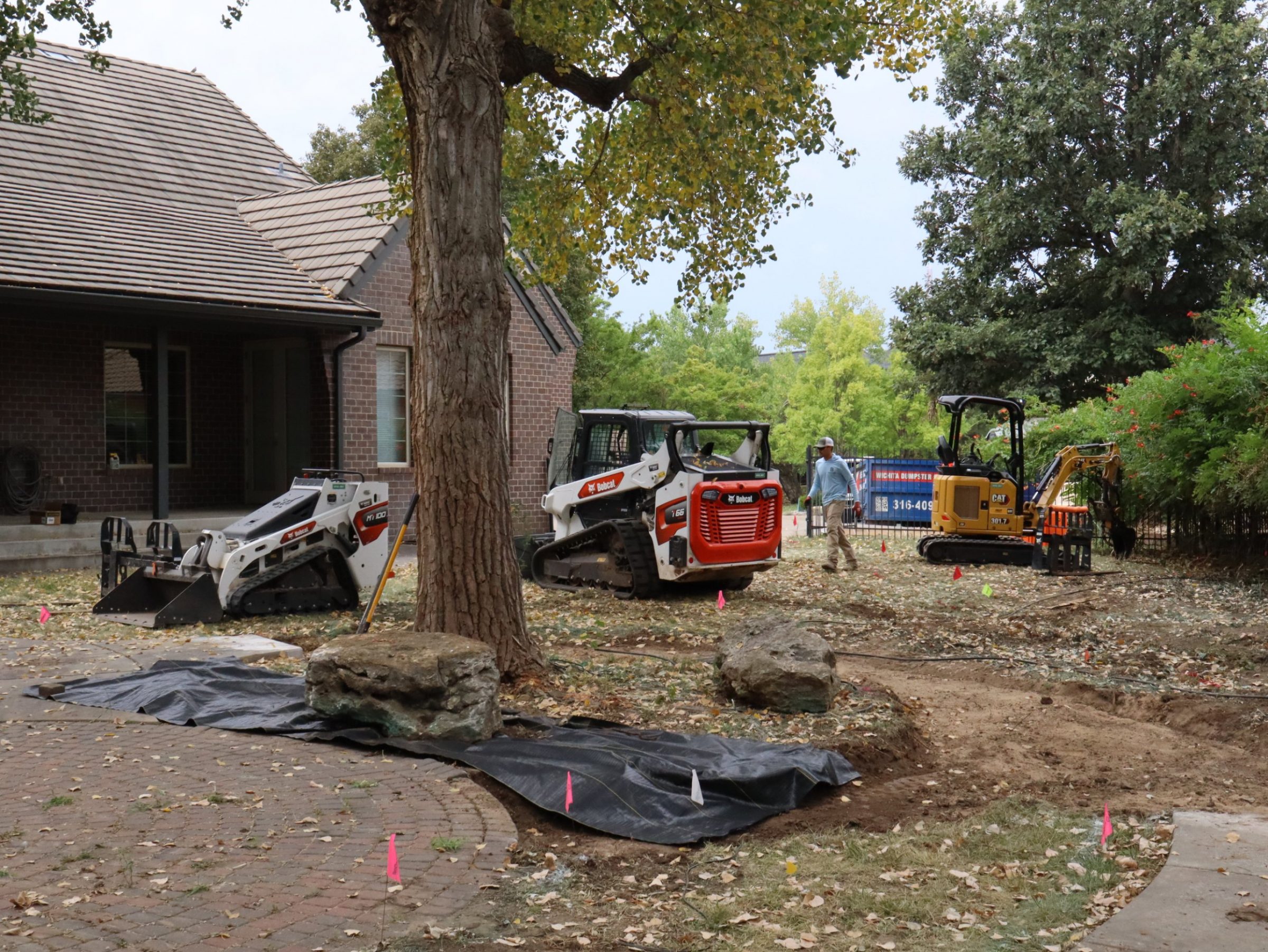 Bluestone Landscaping crew and equipment on a Wichita job site